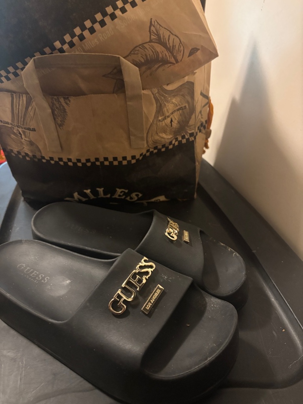 Guess Black Slides with Gold Logo Accents